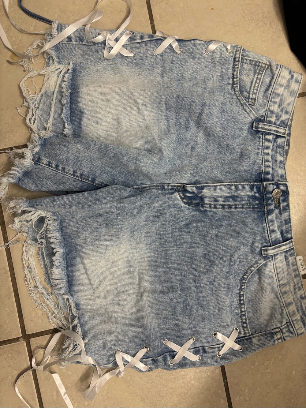 Light Wash Distressed Denim Shorts with Side Lace-Up